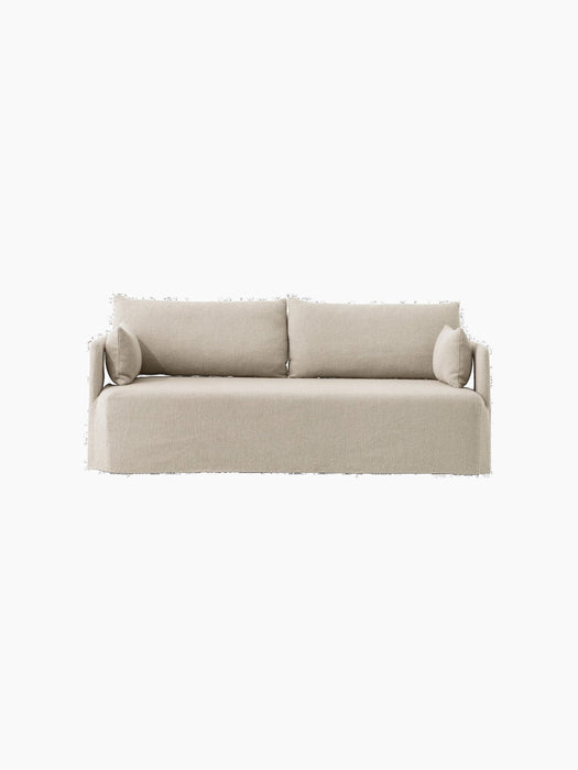 The Offset Sofa with Loose Cover, a 2-seater model shown from the front, upholstered in a sand-coloured textured fabric.
