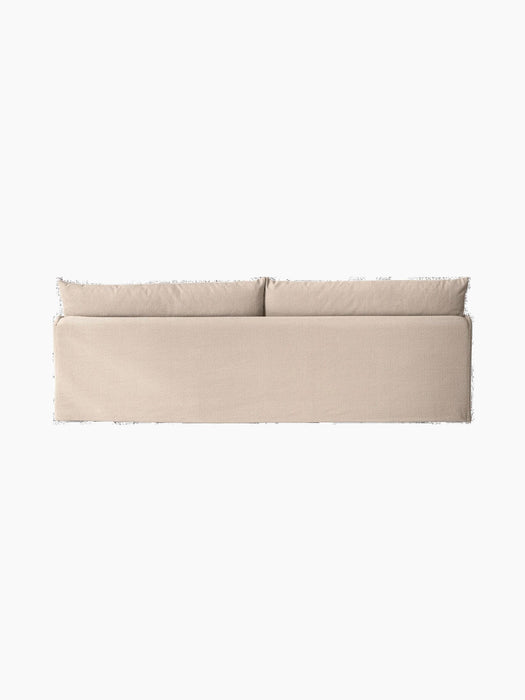 A back view of the sand-coloured Offset Sofa, a 3-seater with a loose cover, showing the two plush back cushions.