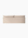 A back view of the sand-coloured Offset Sofa, a 3-seater with a loose cover, showing the two plush back cushions.