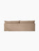 Back view of the Offset Sofa 3-Seater with a loose cover in a textured, light brown 'Flint' fabric on a black background.