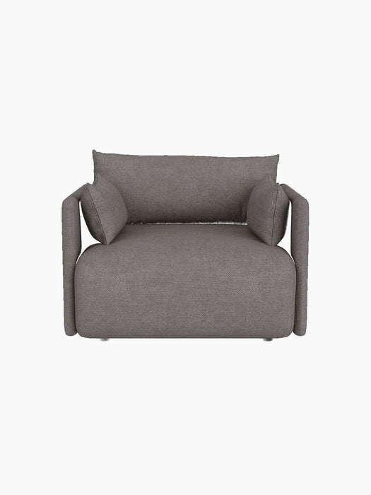 A high-angle, front-on view of the Offset Sofa as a 1-seater armchair, upholstered in a textured grey Audo Bouclé fabric.