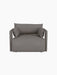 A high-angle, front-on view of the Offset Sofa as a 1-seater armchair, upholstered in a textured grey Audo Bouclé fabric.