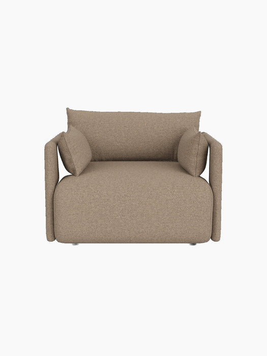 Front view of the Offset Sofa, a 1-seater armchair upholstered in textured Logan Flint fabric against a black background.