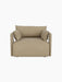Front view of the Offset Sofa, a 1-seater armchair upholstered in light beige Audo Bouclé 02 fabric on black background