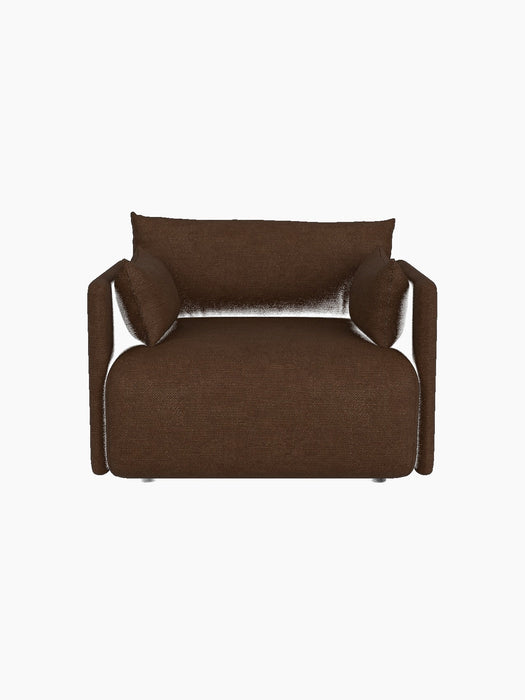 Front view of the Offset Sofa armchair in brown Audo Bouclé 07 fabric. A one-seater sofa has a boxy frame and soft cushions.