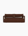 A front view of the Offset Sofa, a 2-seater upholstered in textured, brown Audo Bouclé 08 fabric against a black background.