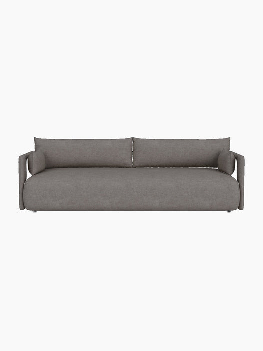 A front view of the Offset Sofa, a 3-seater upholstered in textured, light-coloured Audo Bouclé 16, on a black background.