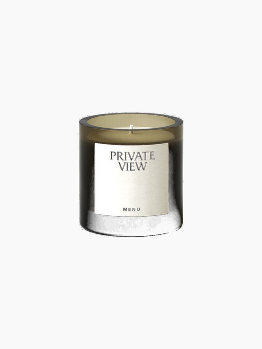 Olfacte Scented Candle, Private View. A dark glass votive with off-white wax and a label reading 'Private View' and 'MENU'.