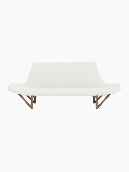 Front view of the Pagode Sofa with light grey Hallingdal 110 upholstery and walnut frame with distinctive V-shaped legs.