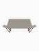 Back view of the Pagode Sofa in light grey Re-Wool upholstery with a walnut frame and V-shaped legs on a black background.