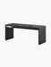 The Plinth Bridge in Nero Marquina, a long and low rectangular bench of black marble with white veins, viewed at an angle.