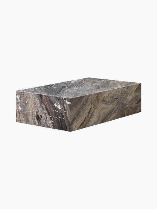 Angled view of the Plinth Low in Grey Galaxy Marble, a podium showcasing the stone's complex grey and brown veining.