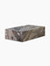 Angled view of the Plinth Low in Grey Galaxy Marble, a podium showcasing the stone's complex grey and brown veining.