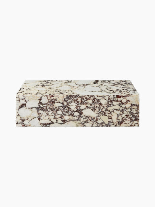 Front view of the Plinth Low table, a rectangular block of Calacatta Viola marble with bold purple and rose-coloured veining.