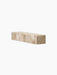 A Plinth Shelf in Kunis Breccia marble, a rectangular block of beige and cream stone with brown fragments, shown at an angle.