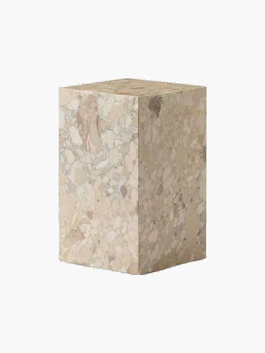 Angled view of the Plinth Tall in Kunis Breccia. The rectangular pedestal features a richly patterned beige marble composite.