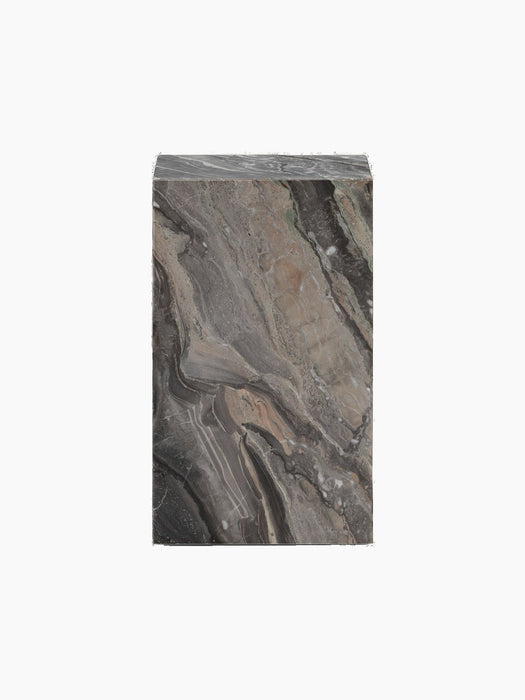 Front view of a rectangular marble plinth. The marble has a dramatic pattern with diagonal veins of grey, brown, and black.