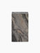 Front view of a rectangular marble plinth. The marble has a dramatic pattern with diagonal veins of grey, brown, and black.
