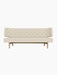 Front view of the Radiohus Sofa P2 upholstered in Hallingdal 200 fabric with Dakar leather buttons, on a natural oak frame.