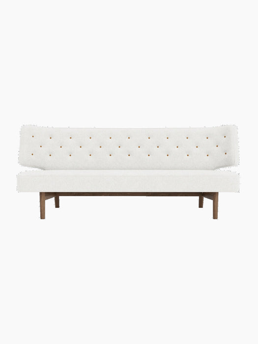 Front view of Radiohus Sofa P2 with walnut frame, light grey Hallingdal upholstery, and brown leather buttons on backrest.