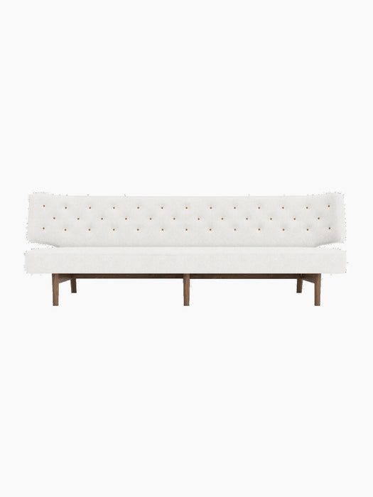 Front view of the Radiohus Sofa P3 with off-white Hallingdal upholstery, tufted back with brown buttons and walnut frame.