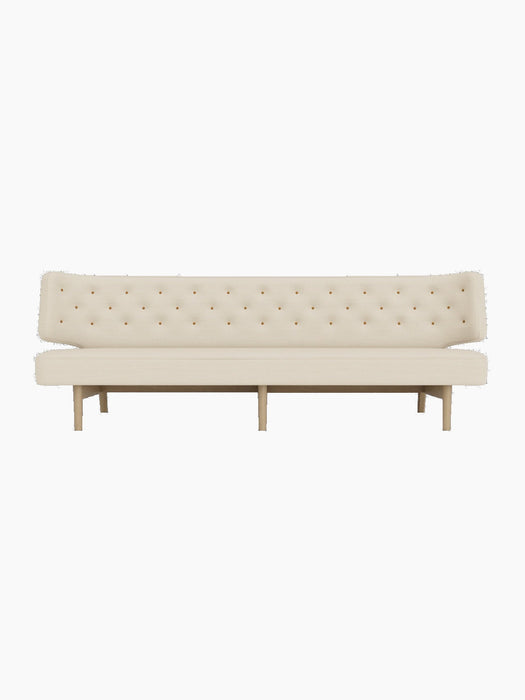 Front view of the Radiohus Sofa P3 in cream Hallingdal fabric with tan leather buttons and a natural oak frame.