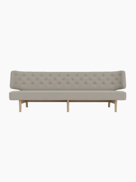 Front-on studio shot of the Radiohus Sofa P3 in light grey Re-Wool fabric with a natural oak base and brown leather buttons.
