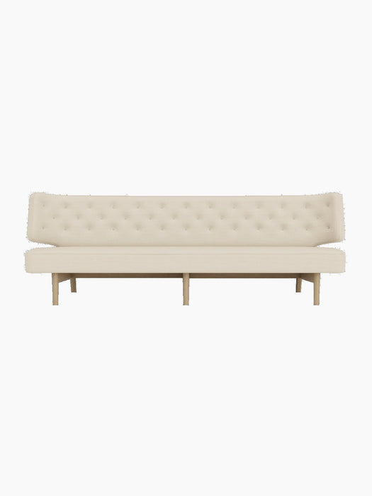 A front view of the Radiohus Sofa P3, featuring light cream upholstery with a button-tufted backrest on a natural oak frame.