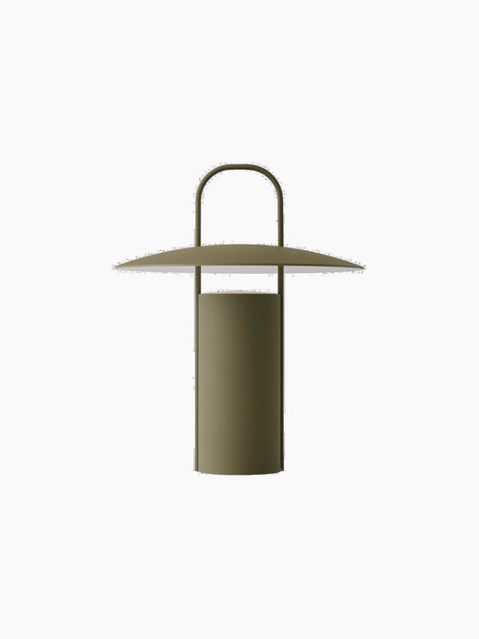 Ray Table Lamp, Portable, in dusty green, with a cylindrical base, wide, flat shade and a handle on top.