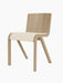 A three-quarter view of the Ready Dining Chair with a natural oak frame and its seat upholstered in Logan Jasmin fabric.