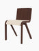 The Ready Dining Chair with its seat upholstered in cream Logan Jasmine fabric and its frame made of dark, red-stained oak.
