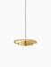 Front view of the Resonant Pendant in polished brass, featuring four concentric shades hanging against a black background.