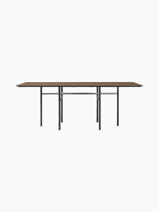 Snaregade Dining Table, Rectangular, with a dark stained oak top and black steel frame on a black background.