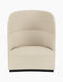 An aerial view of the Tearoom Lounge Chair, High Back, upholstered in a light beige fabric, set against a black background.