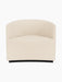 Front view of the Tearoom Lounge Chair upholstered in Logan Jasmine, a textured cream fabric, on a recessed dark base.