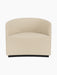 A front-on shot of the sculptural Tearoom Lounge Chair, fully upholstered in a textured, sand-coloured Logan Sand fabric.