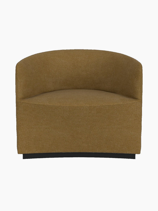 A front-on view of the Tearoom Lounge Chair upholstered in a textured, ochre-coloured Audo Bouclé 06 on a black background.