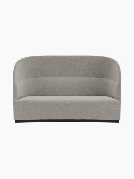 The Tearoom Sofa, High Back in Safire 006 fabric. A front view showing its curved, high-backed silhouette and dark base.