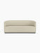A front-on view of the Tearoom Sofa upholstered in a light beige, textured Savanna 202 fabric against a black background.