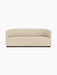 A front-on photograph of the Tearoom Sofa upholstered in a light beige Logan Sand fabric, set against a black background.