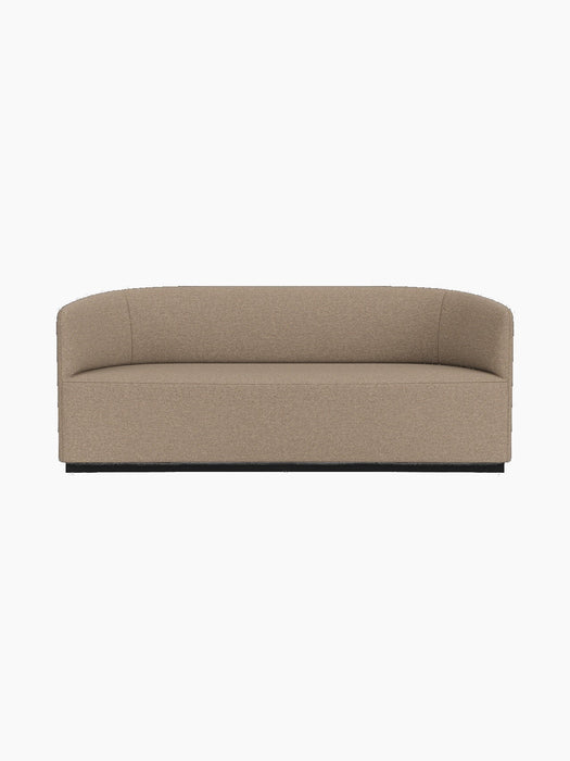 Front view of the Tearoom Sofa in textured Logan Flint fabric, featuring continuous curved back and arms on a recessed base.