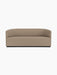 Front view of the Tearoom Sofa in textured Logan Flint fabric, featuring continuous curved back and arms on a recessed base.