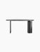 The Eclipse Desk in black lacquered oak, showcasing its asymmetrical design with one panel and one column leg.
