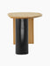 Side profile of The Eclipse Desk in natural oiled oak, detailing the curved tabletop and large, black cylindrical leg.