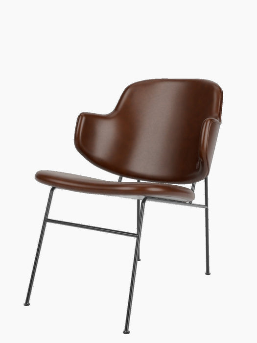 A three-quarter view of The Penguin Lounge Chair, fully upholstered in smooth brown leather with a slender black steel frame.