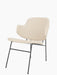A three-quarter view of The Penguin Lounge Chair, upholstered in textured cream Logan Jasmine fabric on a black steel frame.