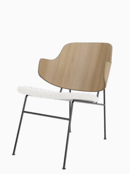 A side view of The Penguin Lounge Chair, with a natural oak backrest, white upholstered seat and a slender black metal frame.