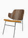 The Penguin Lounge Chair, featuring a curved walnut veneer backrest and a tan upholstered seat on a thin black metal frame.