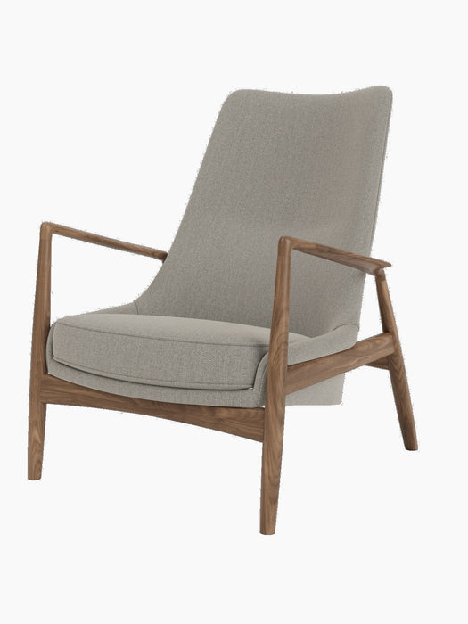 Three-quarter view of The Seal Lounge Chair, High Back, featuring a walnut frame and light grey Re-wool 0218 upholstery.