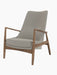 Three-quarter view of The Seal Lounge Chair, High Back, featuring a walnut frame and light grey Re-wool 0218 upholstery.